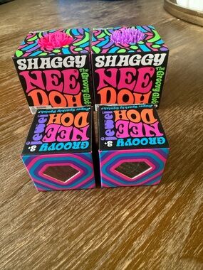 Shaggy Nee Doh Groovy Globe Stress Balls - Bright Pink/Purple and Nee Doh Jewels